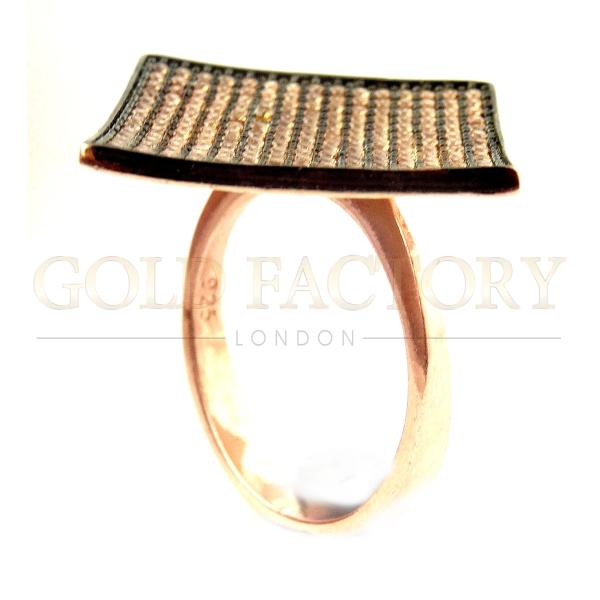 Gold Ring With Black And Gold Design