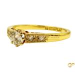 Gold Solitaire Engagement Ring With Cz Stones